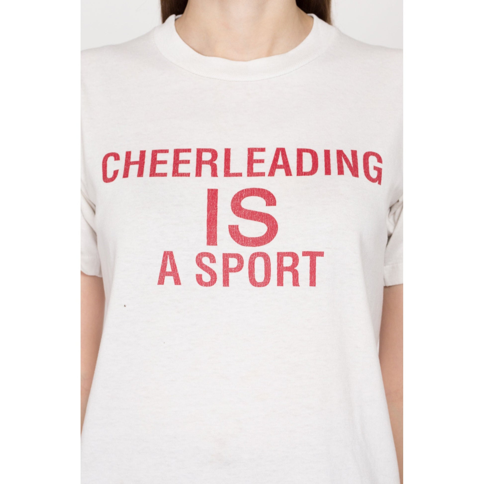 Small 90s "Cheerleading IS A Sport" T Shirt | Vintage White Cheerleader Graphic Tee