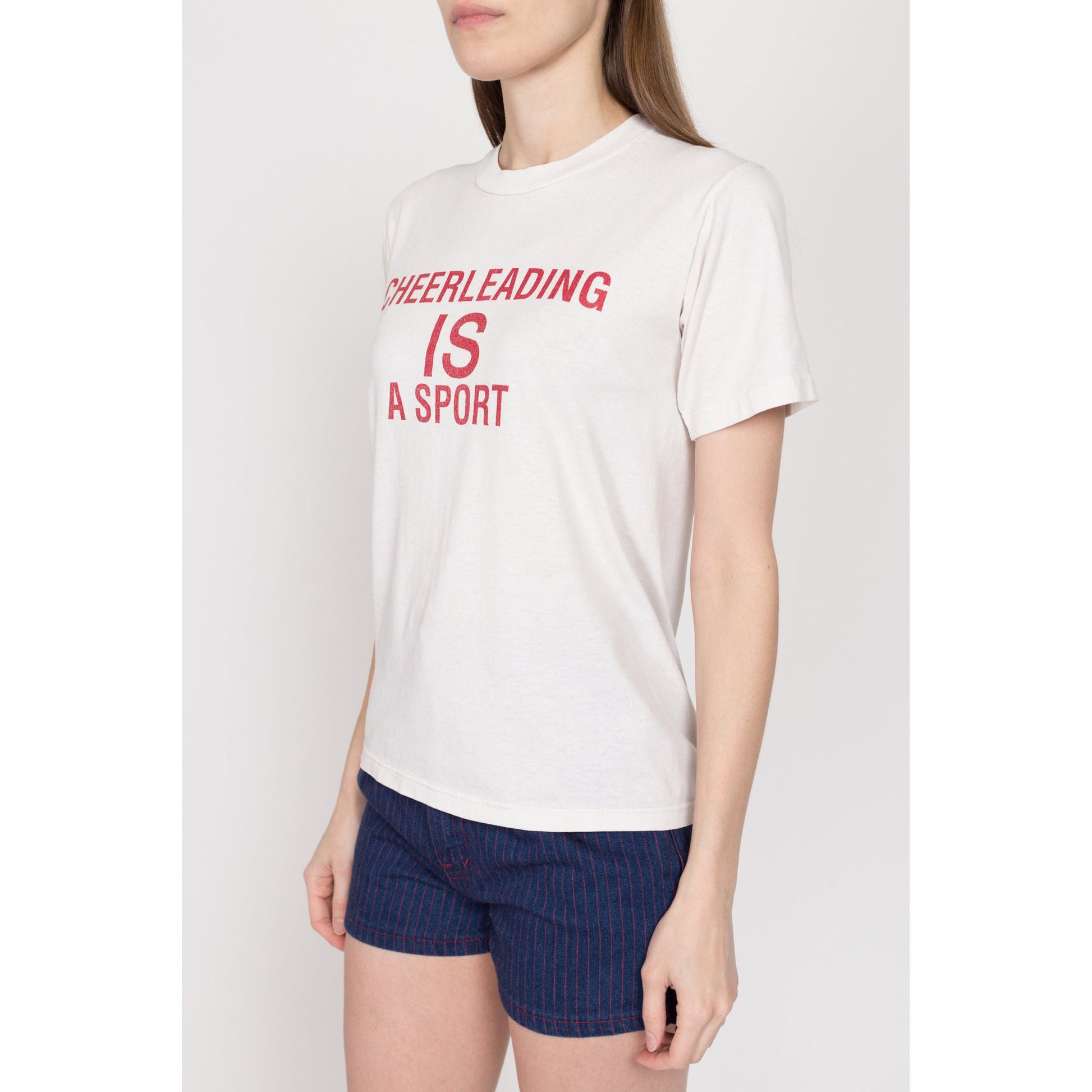 Small 90s "Cheerleading IS A Sport" T Shirt | Vintage White Cheerleader Graphic Tee