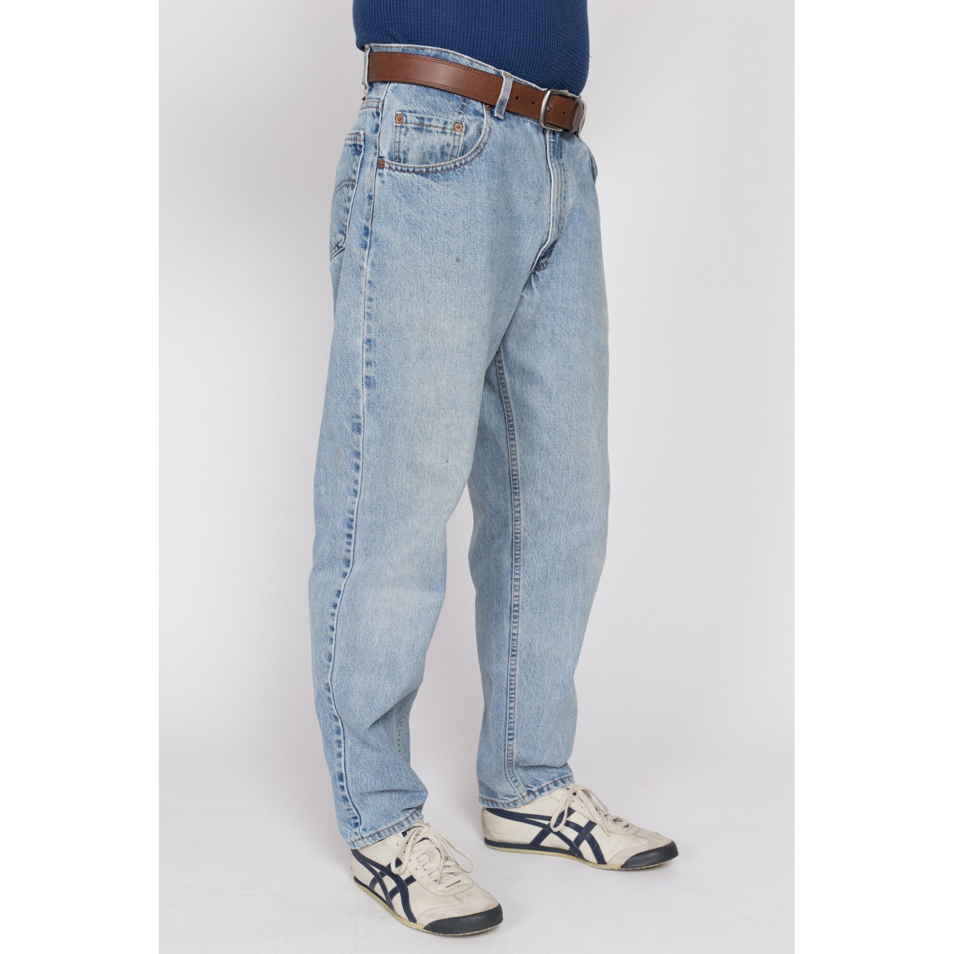 34x30 Vintage Levis 560 Made In USA Faded Light Wash Jeans | 80s 90s Levi's Distressed Tapered Leg Denim Dad Jeans
