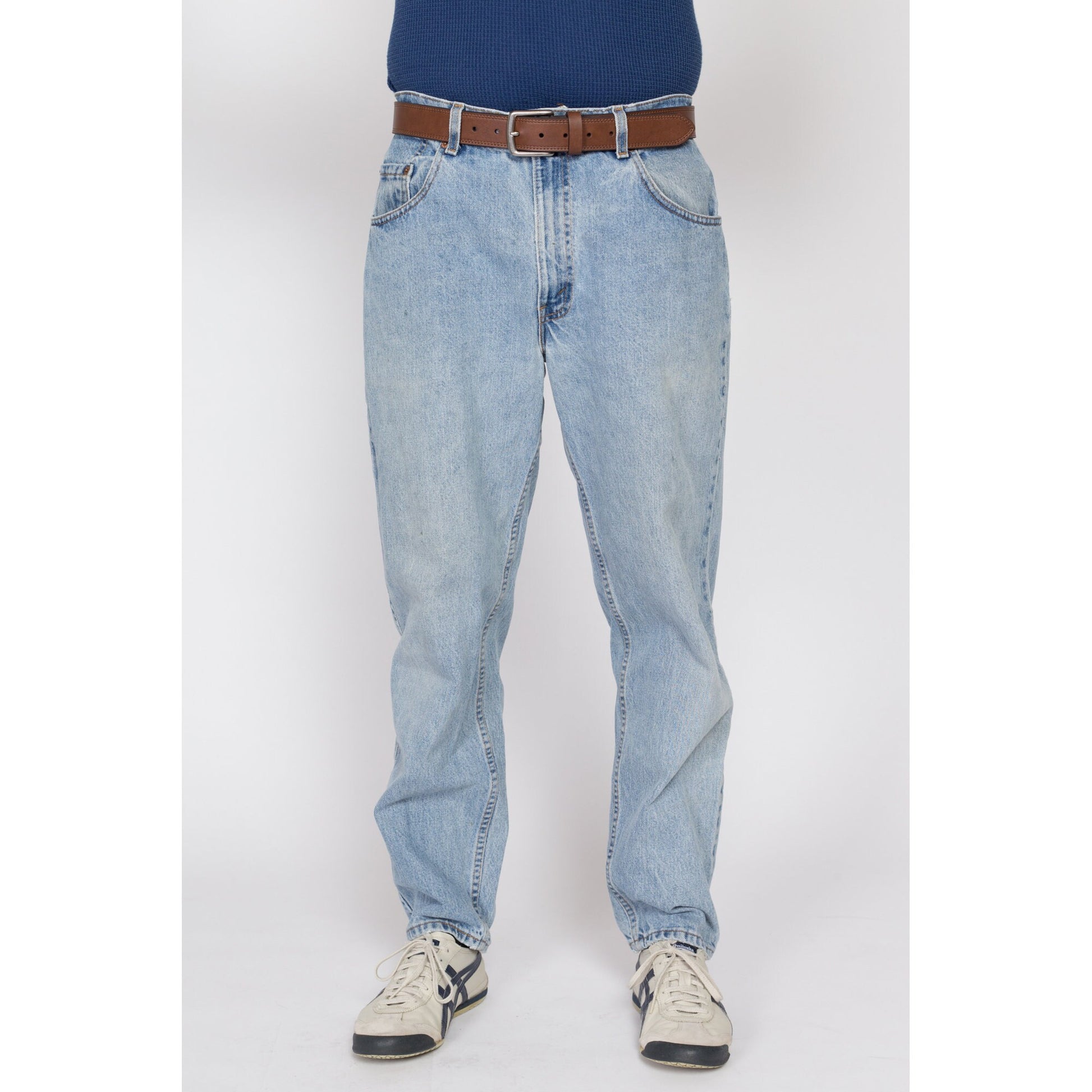 34x30 Vintage Levis 560 Made In USA Faded Light Wash Jeans | 80s 90s Levi's Distressed Tapered Leg Denim Dad Jeans