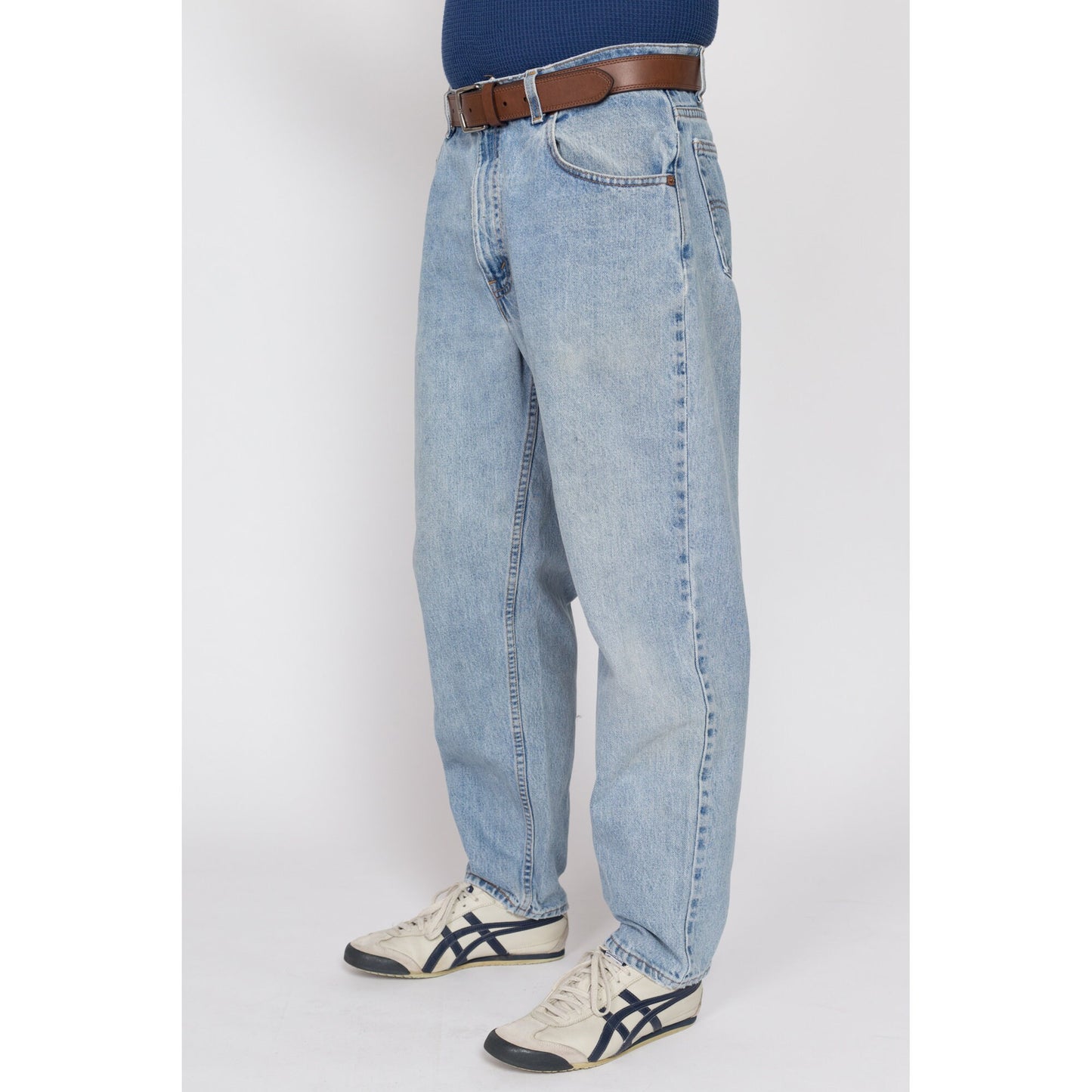 34x30 Vintage Levis 560 Made In USA Faded Light Wash Jeans | 80s 90s Levi's Distressed Tapered Leg Denim Dad Jeans