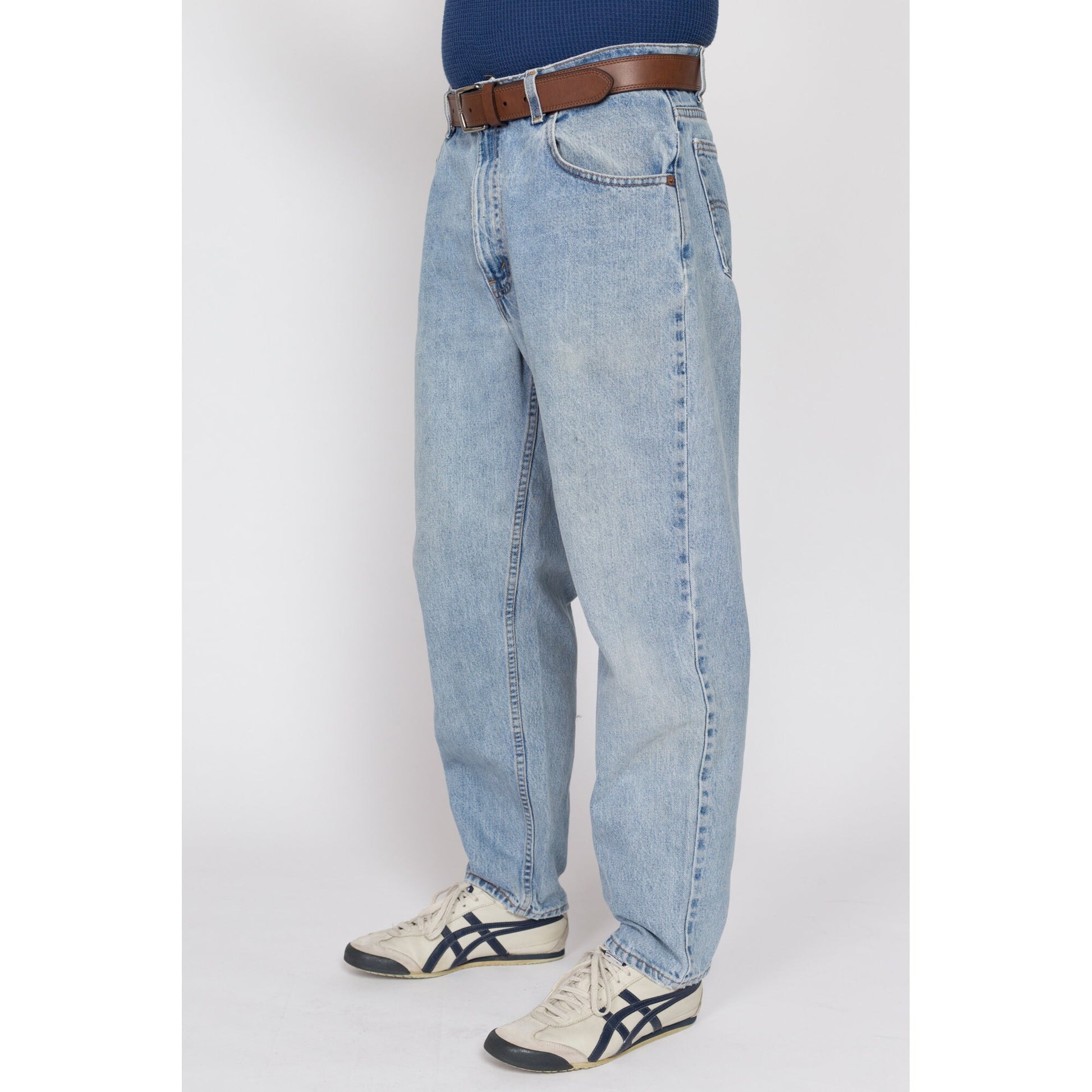 34x30 Vintage Levis 560 Made In USA Faded Light Wash Jeans | 80s 90s Levi's Distressed Tapered Leg Denim Dad Jeans