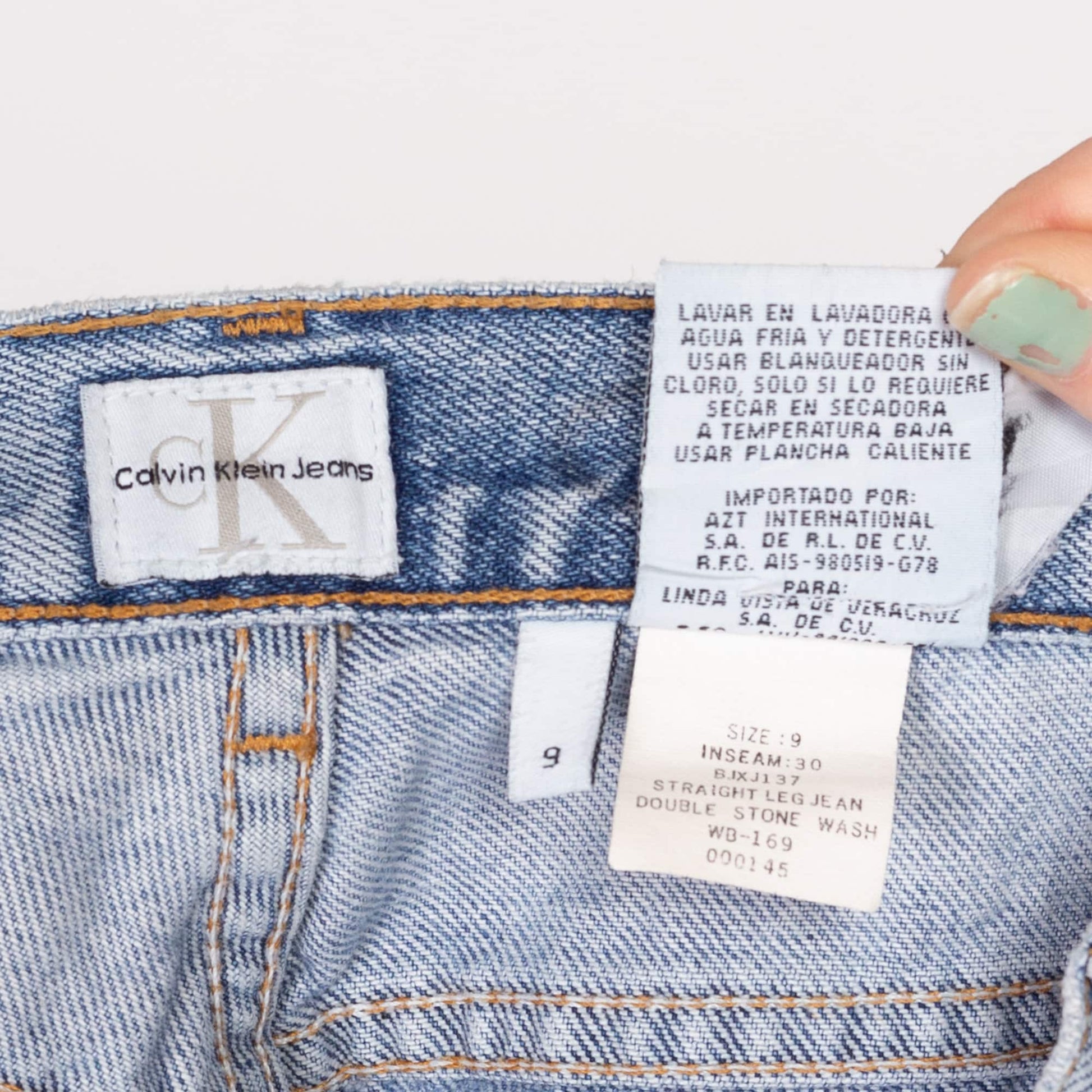 Medium 90s Calvin Klein Light Wash Straight Leg Jeans 30" | Vintage Mid High Waisted CK Stonewash Denim Jeans