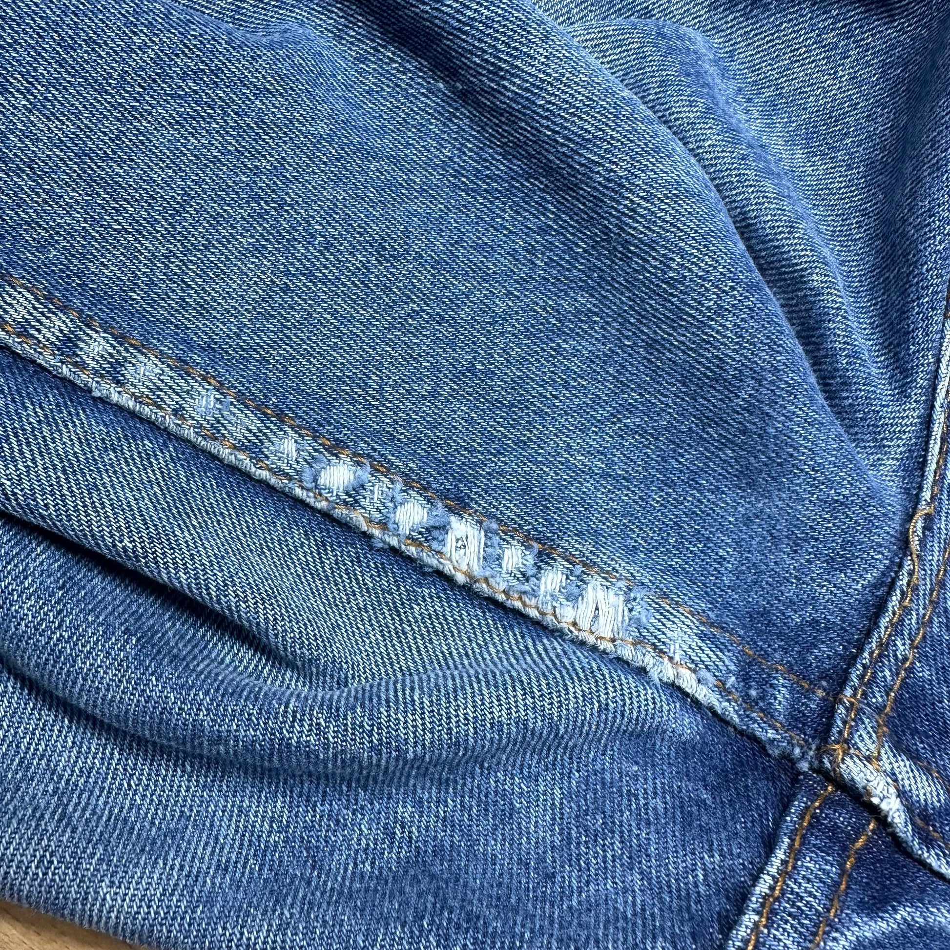 Medium 80s Levis White Tab High Waisted Jeans 28" | Vintage Levi's Medium Wash Denim Tapered Leg Mom Jeans