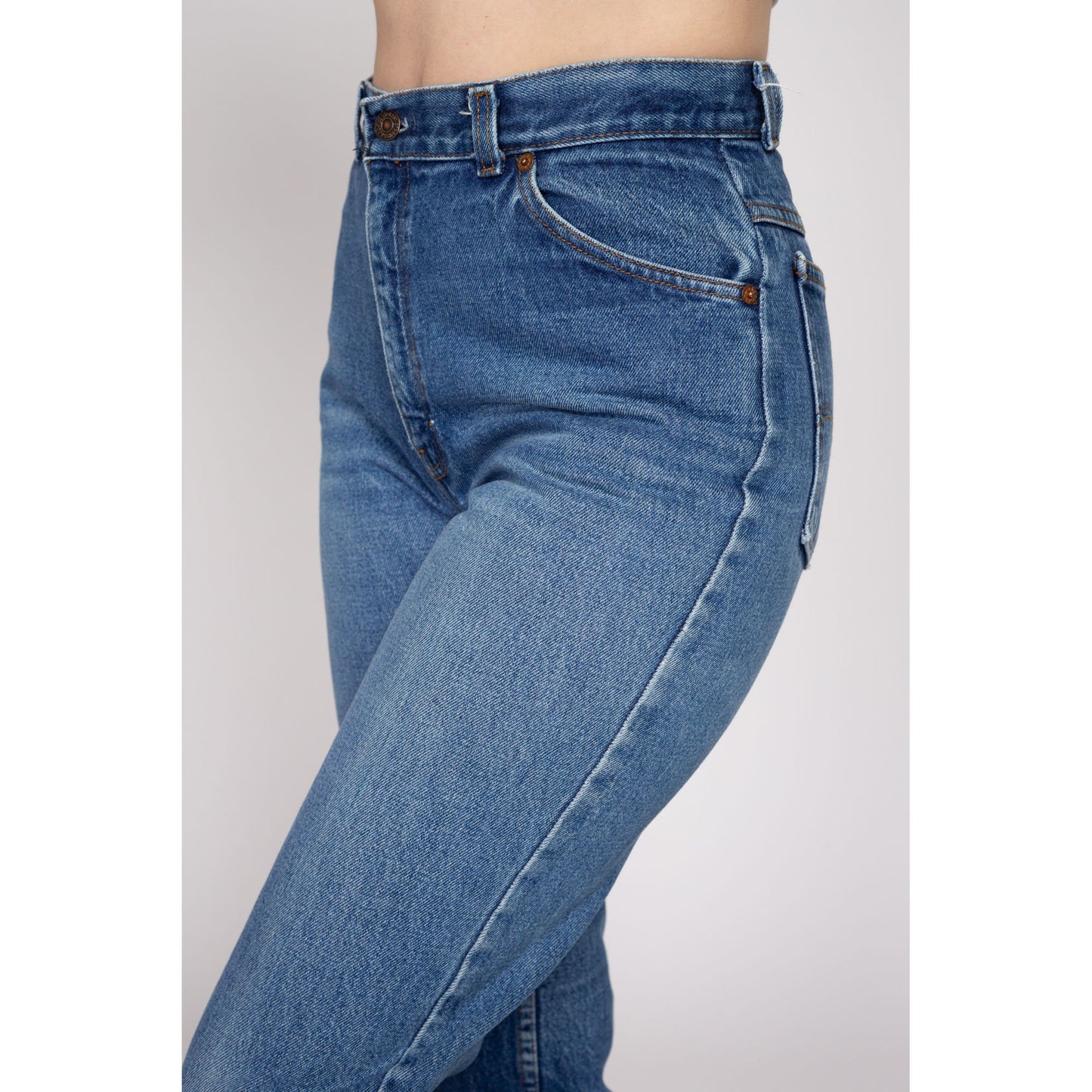 Medium 80s Levis White Tab High Waisted Jeans 28" | Vintage Levi's Medium Wash Denim Tapered Leg Mom Jeans