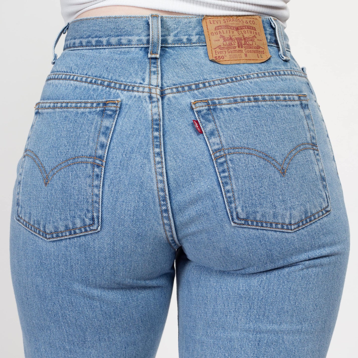Medium 90s Levis 550 Mom Jeans 30" | Vintage Levi's Light Wash Denim High Waisted Tapered Leg Jeans