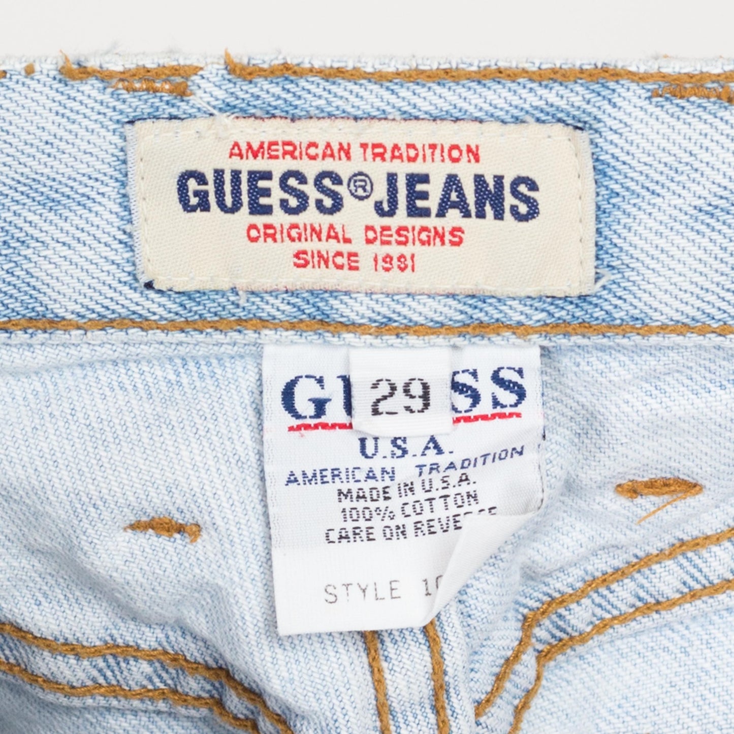 Small 90s Guess High Waisted Light Wash Jeans 26.5" | Vintage Denim Tapered Leg Mom Jeans