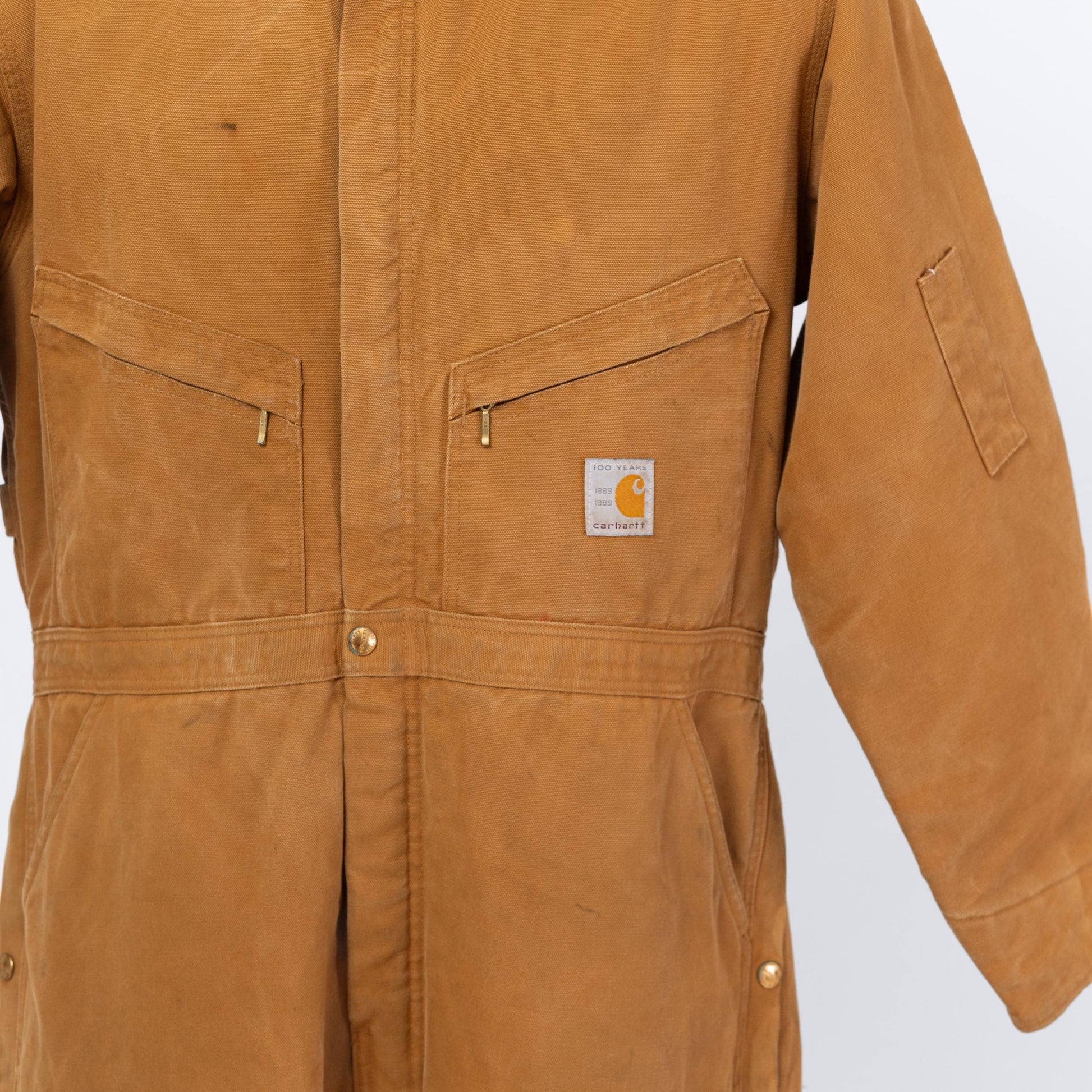 Vintage 80s Carhartt 100 Years Tan Insulated Coveralls - 46 Short | 1989 Distressed Union Made In USA Canvas Quilt Lined Workwear Jumpsuit