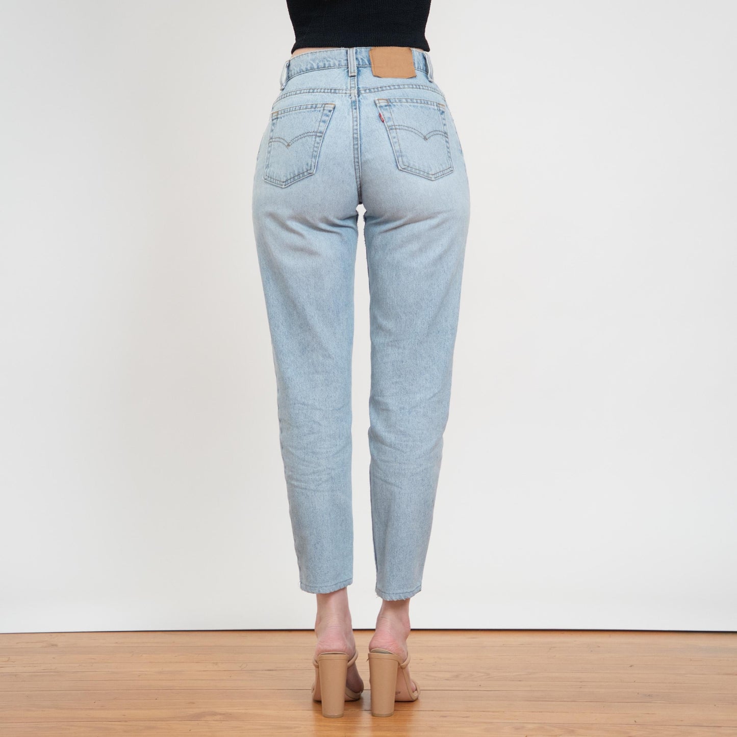 Vintage 90s Levi's 550 High Waist Jeans - Small, 27" Waist | Light Wash Denim Slim Mom Jeans