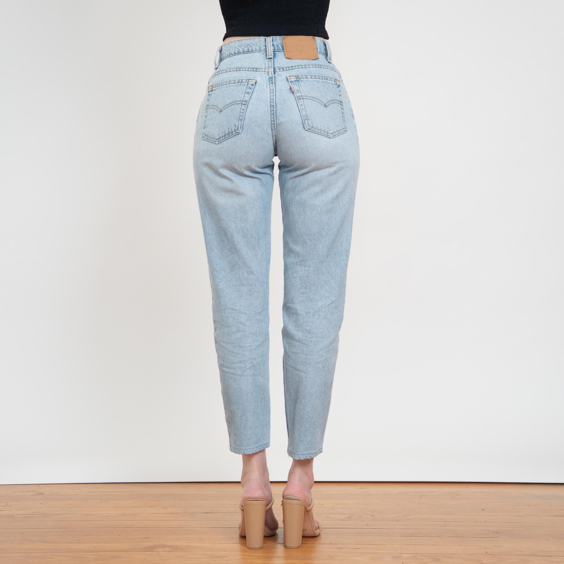 Vintage 90s Levi's 550 High Waist Jeans - Small, 27" Waist | Light Wash Denim Slim Mom Jeans