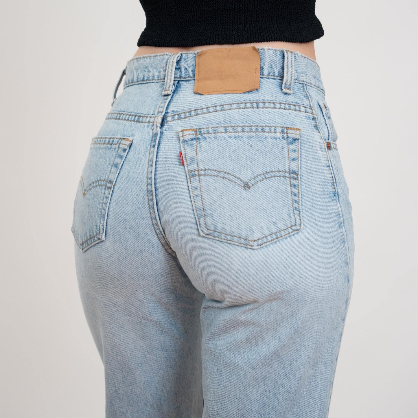 Vintage 90s Levi's 550 High Waist Jeans - Small, 27" Waist | Light Wash Denim Slim Mom Jeans
