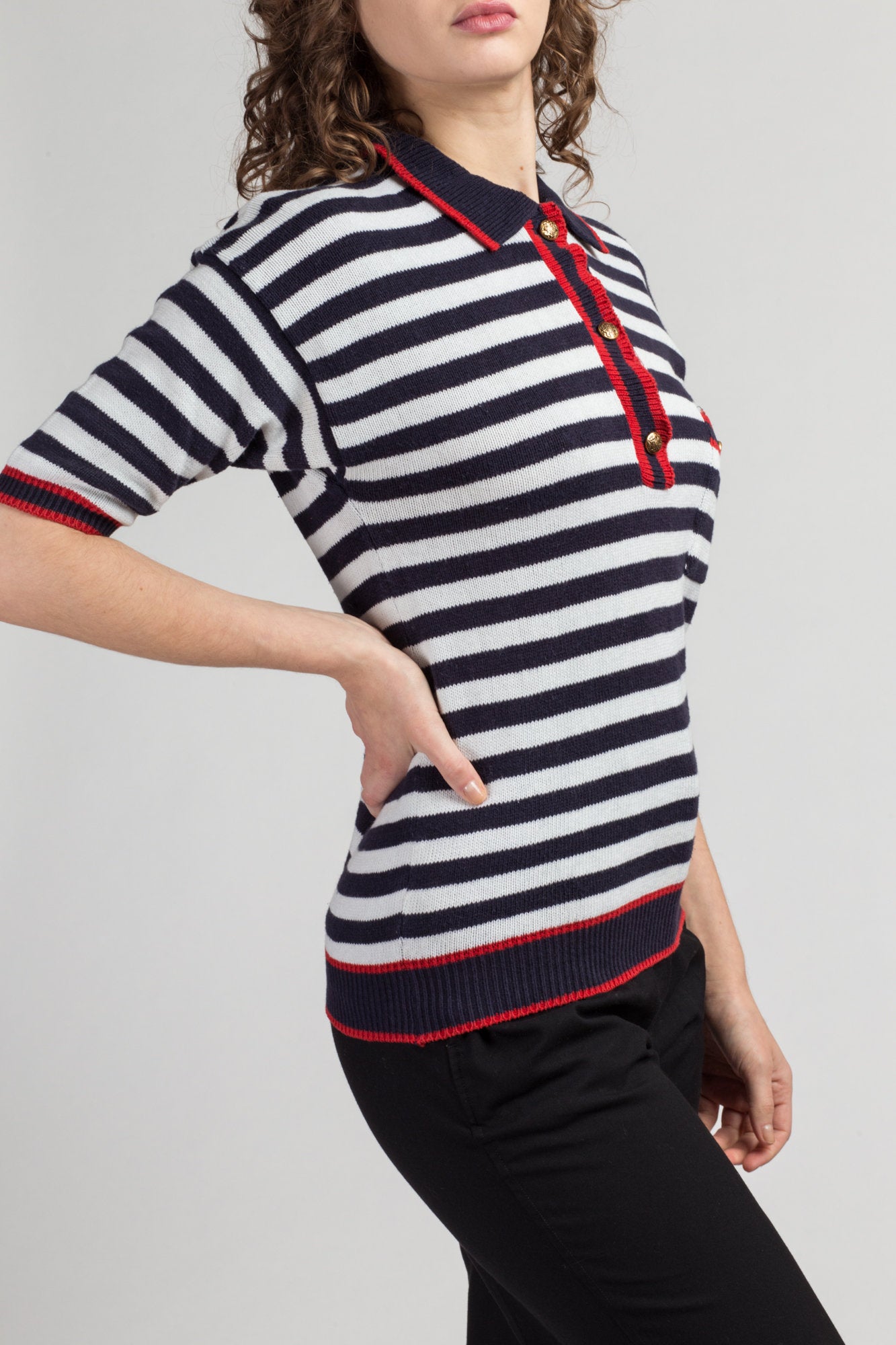 red white and black striped polo shirt