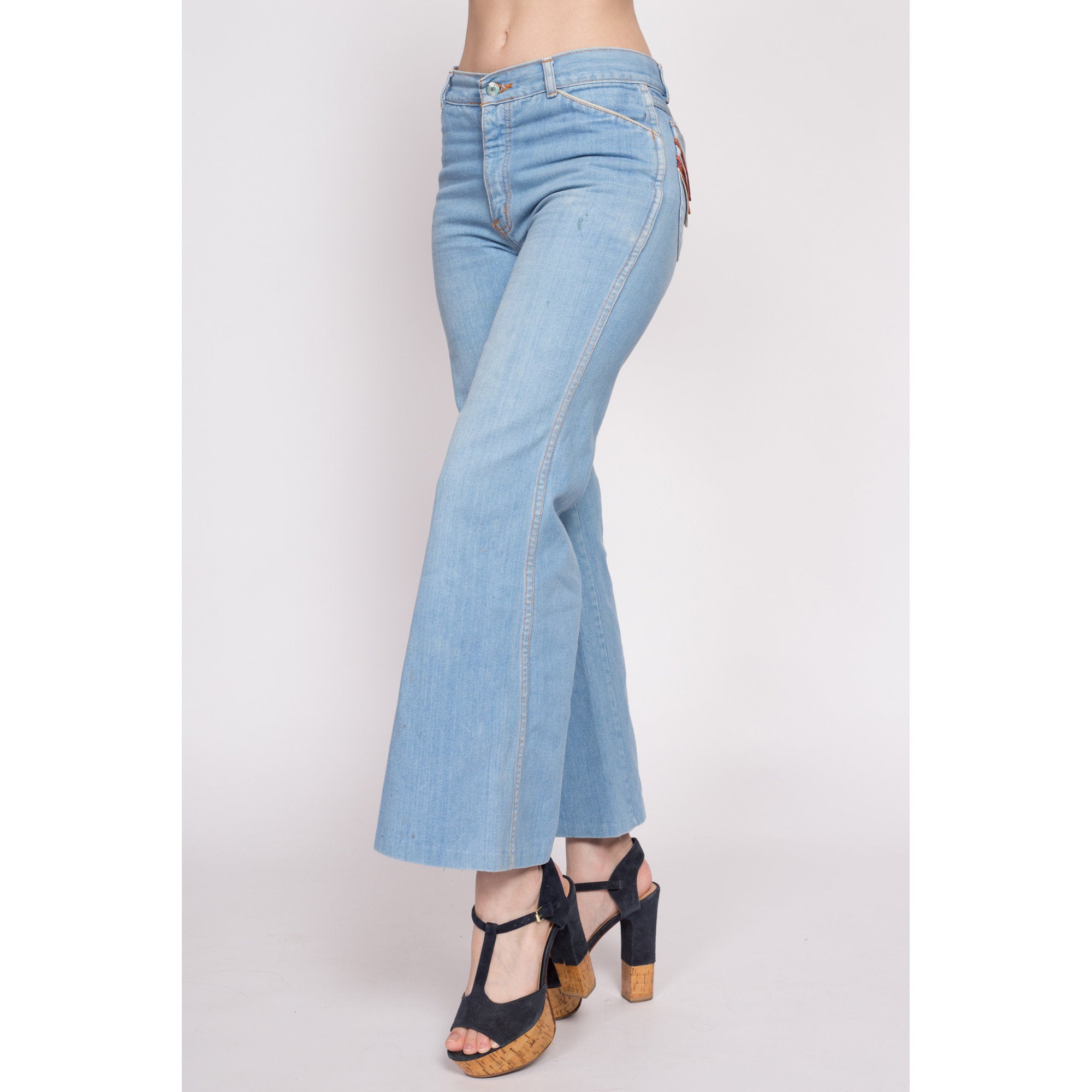 Women Destoryed Flare Jeans Elastic Waist Ripped Bell Bottom Raw Hem  Stretch Denim Pants (Light Blue, Small) at Amazon Women's Jeans store
