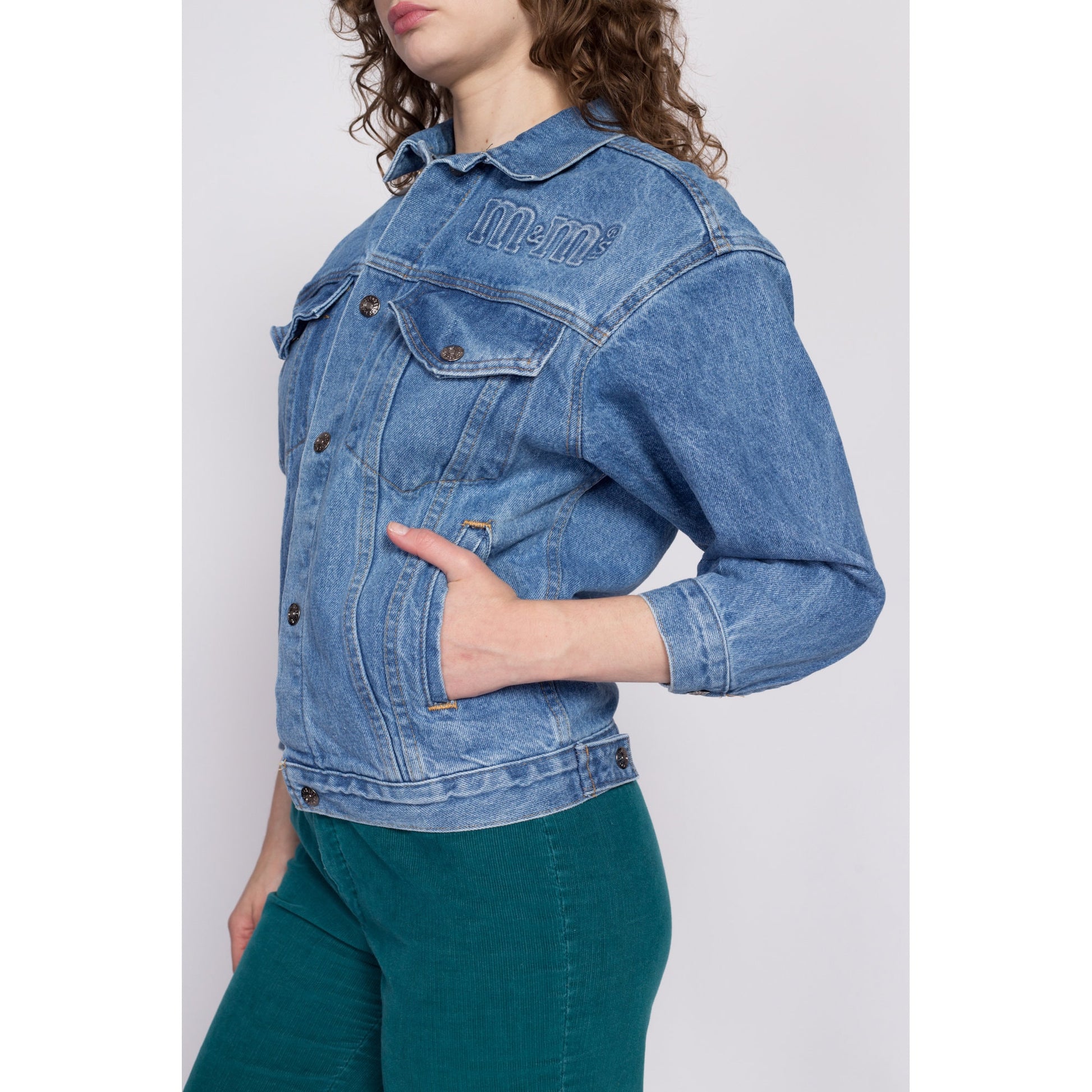 90s M&Ms Embossed Denim Jacket - Petite Small to Medium | Vintage Candy Brand Logo Coin Toss Graphic Medium Wash Jean Jacket