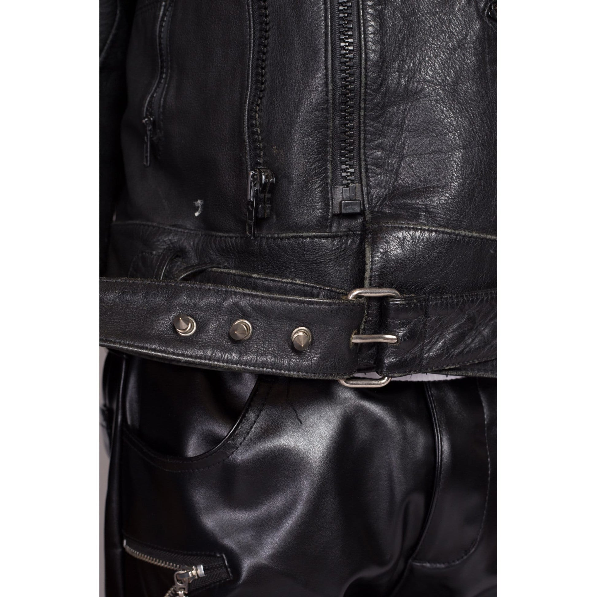 90s Wilsons Black Leather Padded Moto Jacket - Men's Large, Size 44 | Vintage Punk Spike Belted Biker Motorcycle Coat