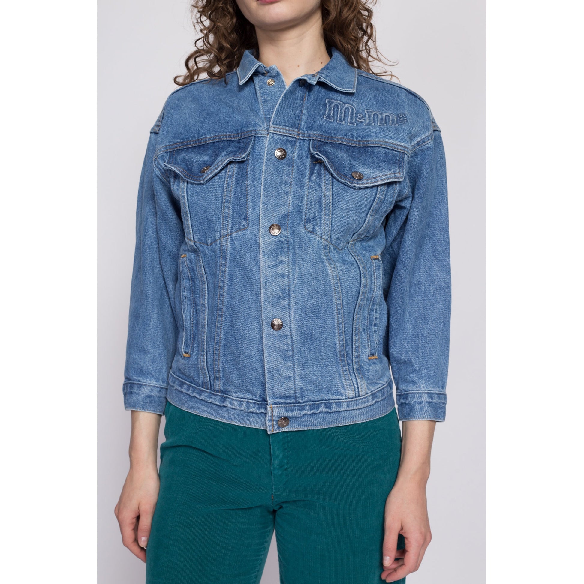 90s M&Ms Embossed Denim Jacket - Petite Small to Medium | Vintage Candy Brand Logo Coin Toss Graphic Medium Wash Jean Jacket