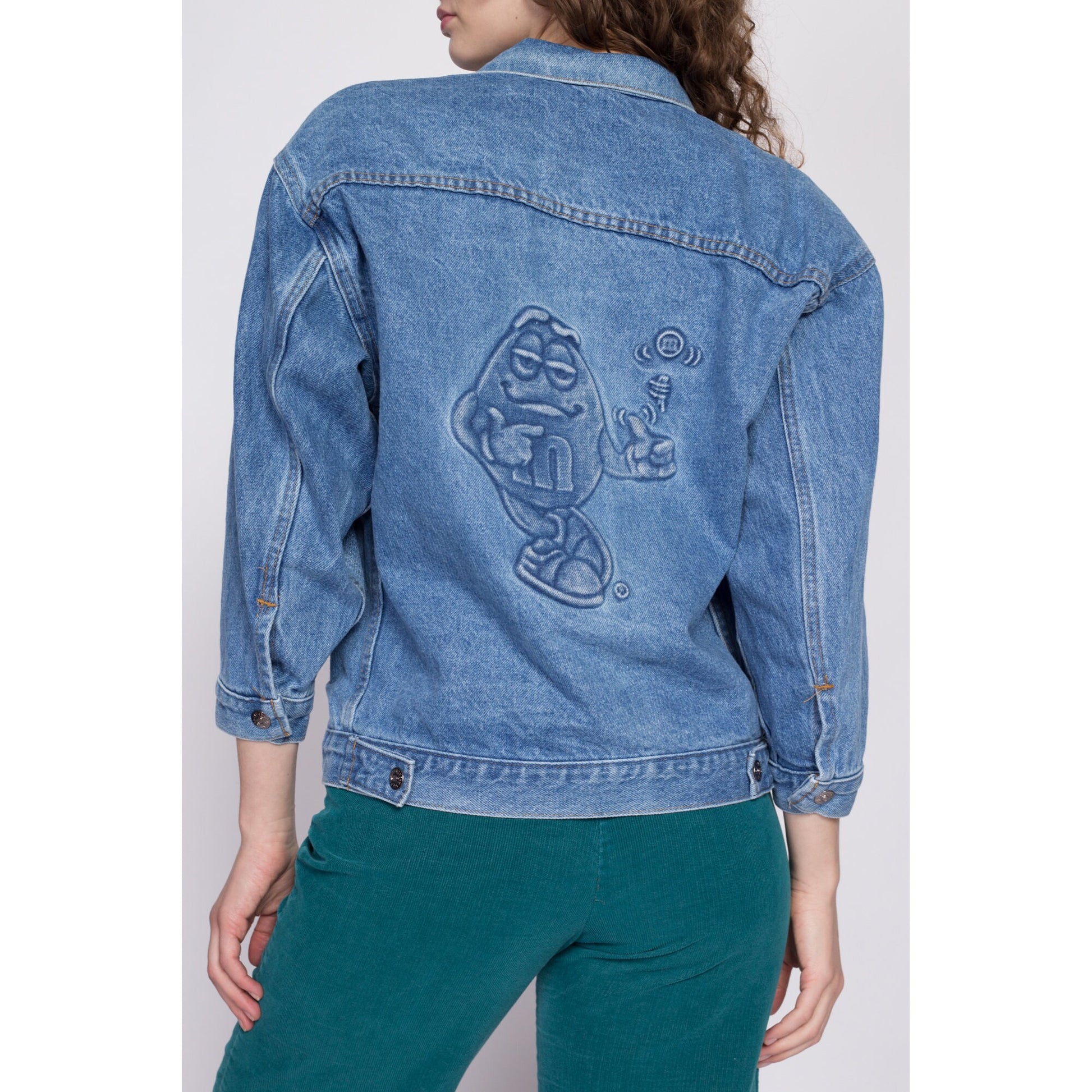 90s M&Ms Embossed Denim Jacket - Petite Small to Medium | Vintage Candy Brand Logo Coin Toss Graphic Medium Wash Jean Jacket