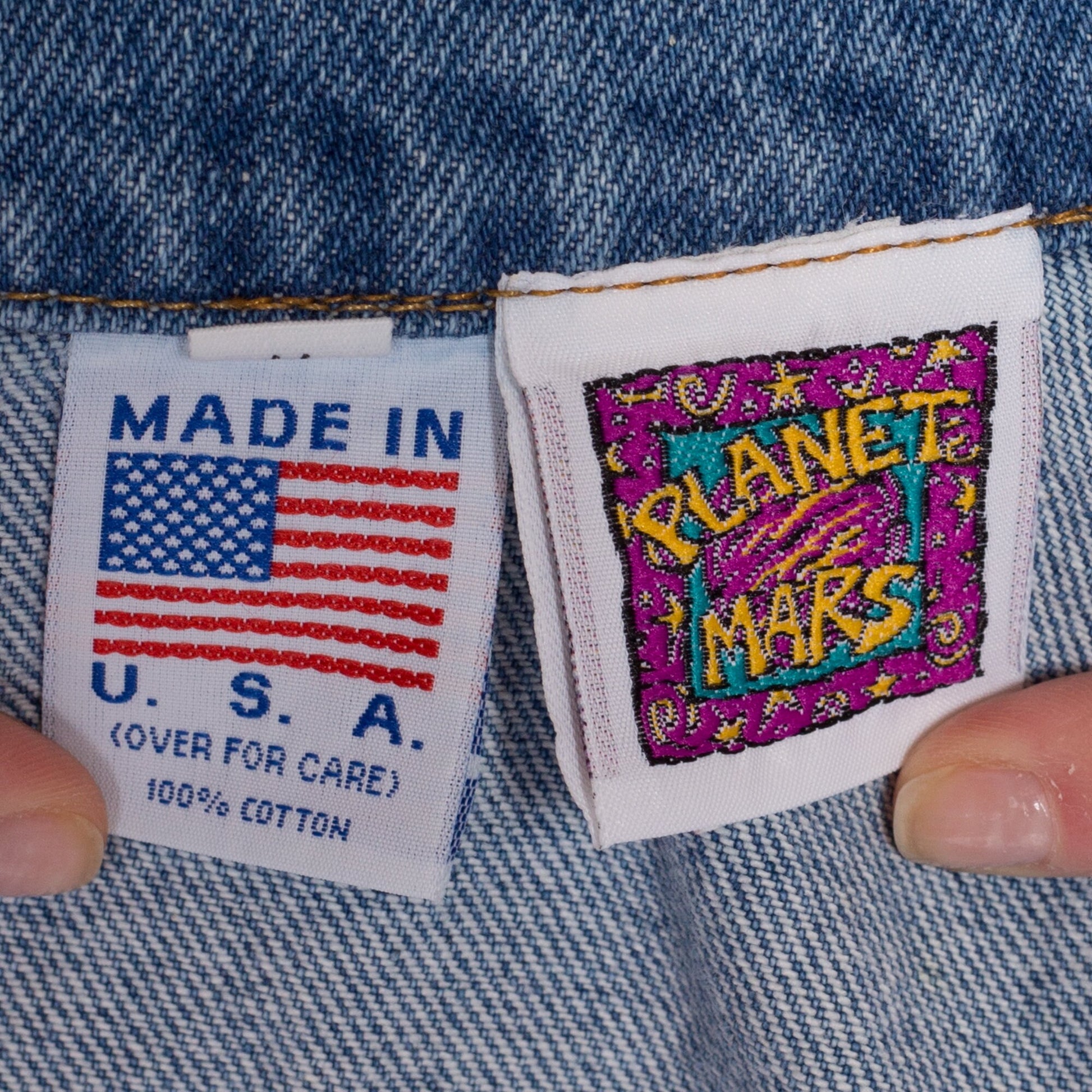 90s M&Ms Embossed Denim Jacket - Petite Small to Medium | Vintage Candy Brand Logo Coin Toss Graphic Medium Wash Jean Jacket