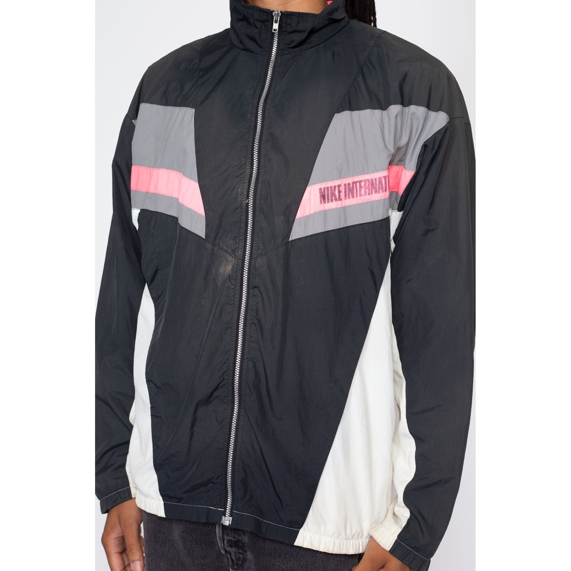 Large 90s Nike International Faded Color Block Windbreaker | Vintage Distressed Streetwear Swoosh Logo Track Jacket