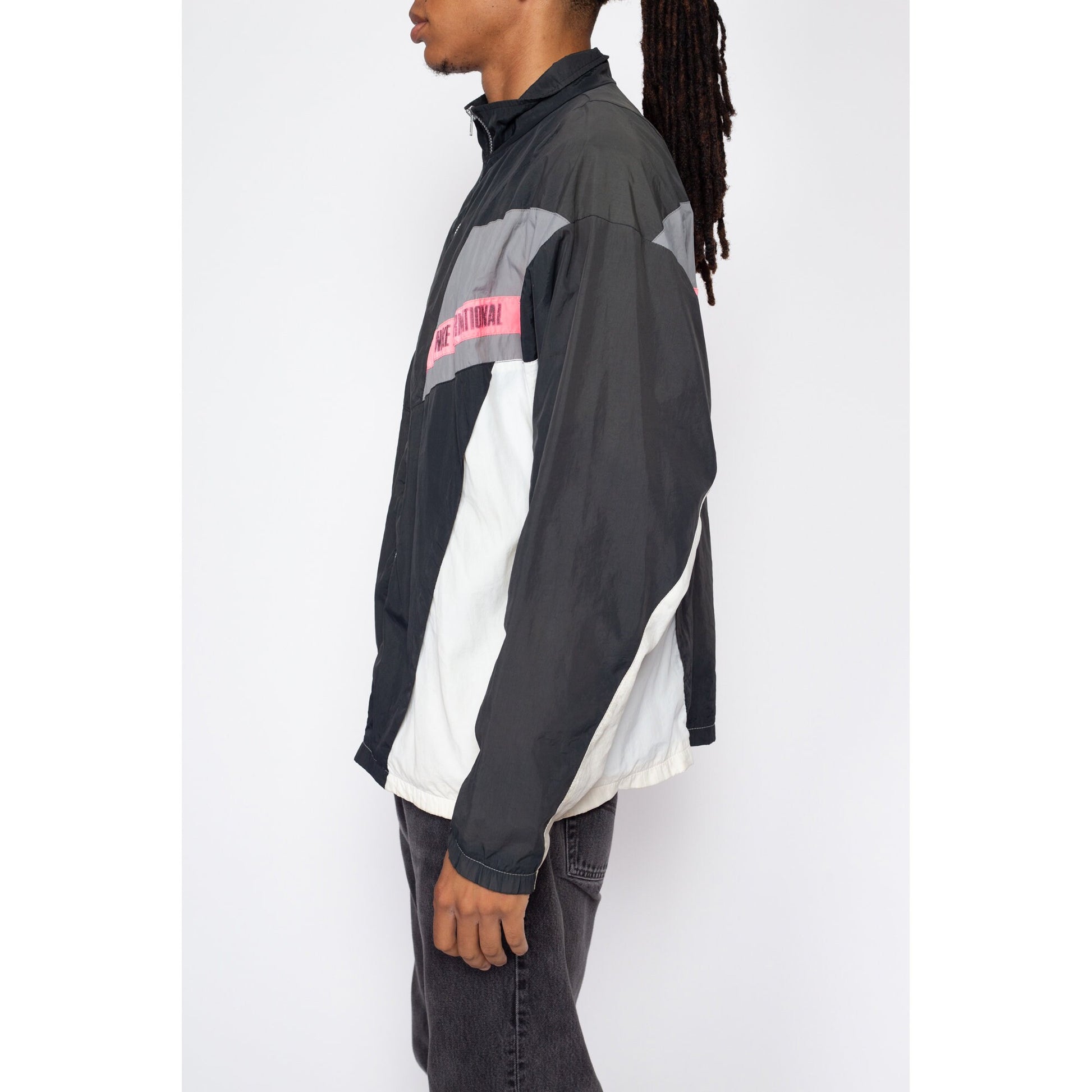 Large 90s Nike International Faded Color Block Windbreaker | Vintage Distressed Streetwear Swoosh Logo Track Jacket